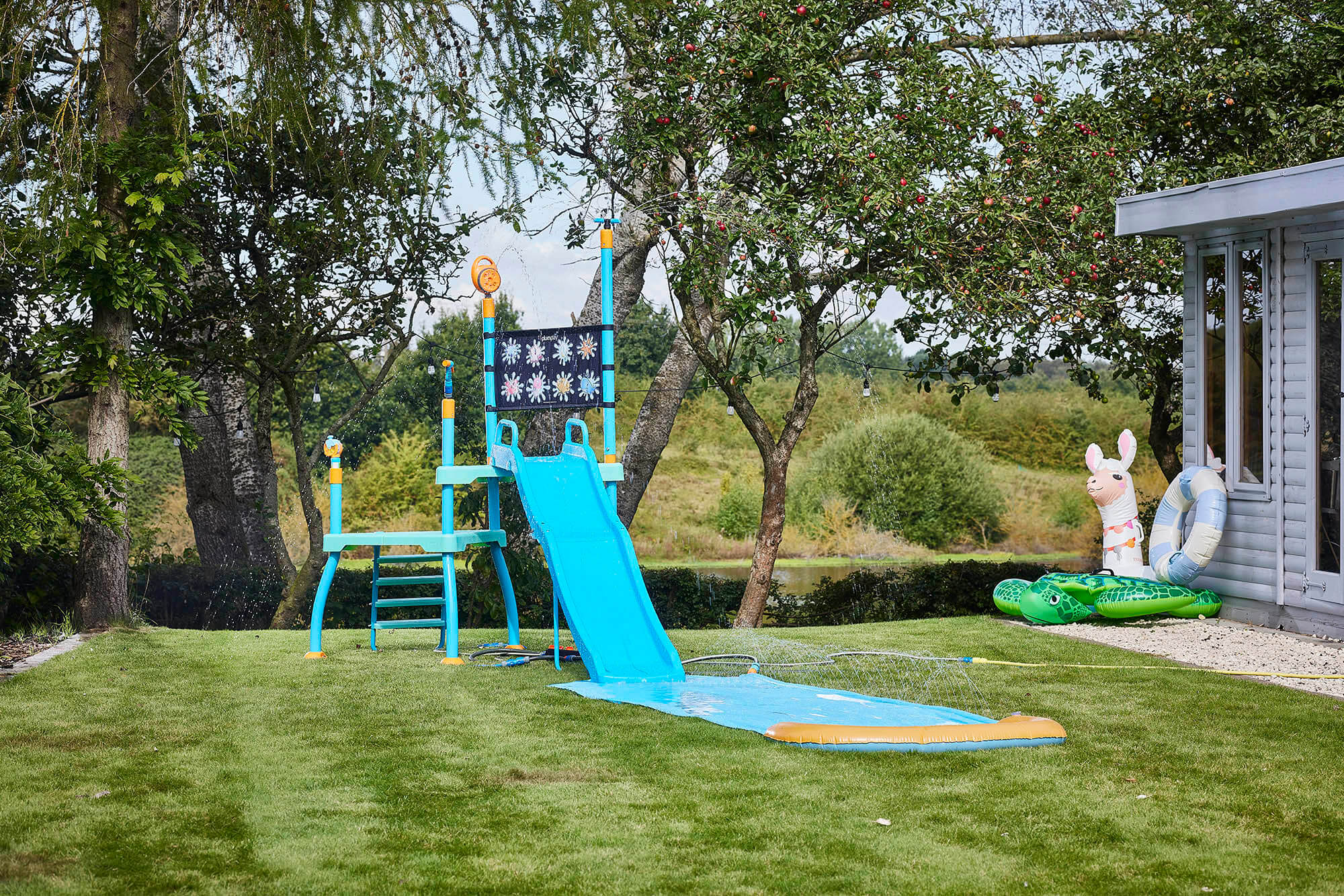 The Plum Water Park Shower Tower is the perfect way to bring the excitement of the water park to the garden.